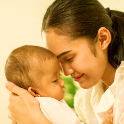 Loving asian mom carying of her newborn baby at ho 2023 11 27 05 07 34 utc 1